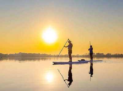 sunset paddleboard